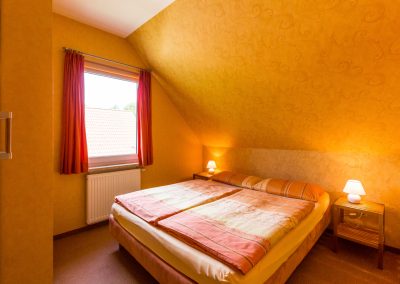 Ferienhaus Sonnenblume Schlafzimmer Doppelbett